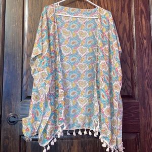 A patterned cardigan.